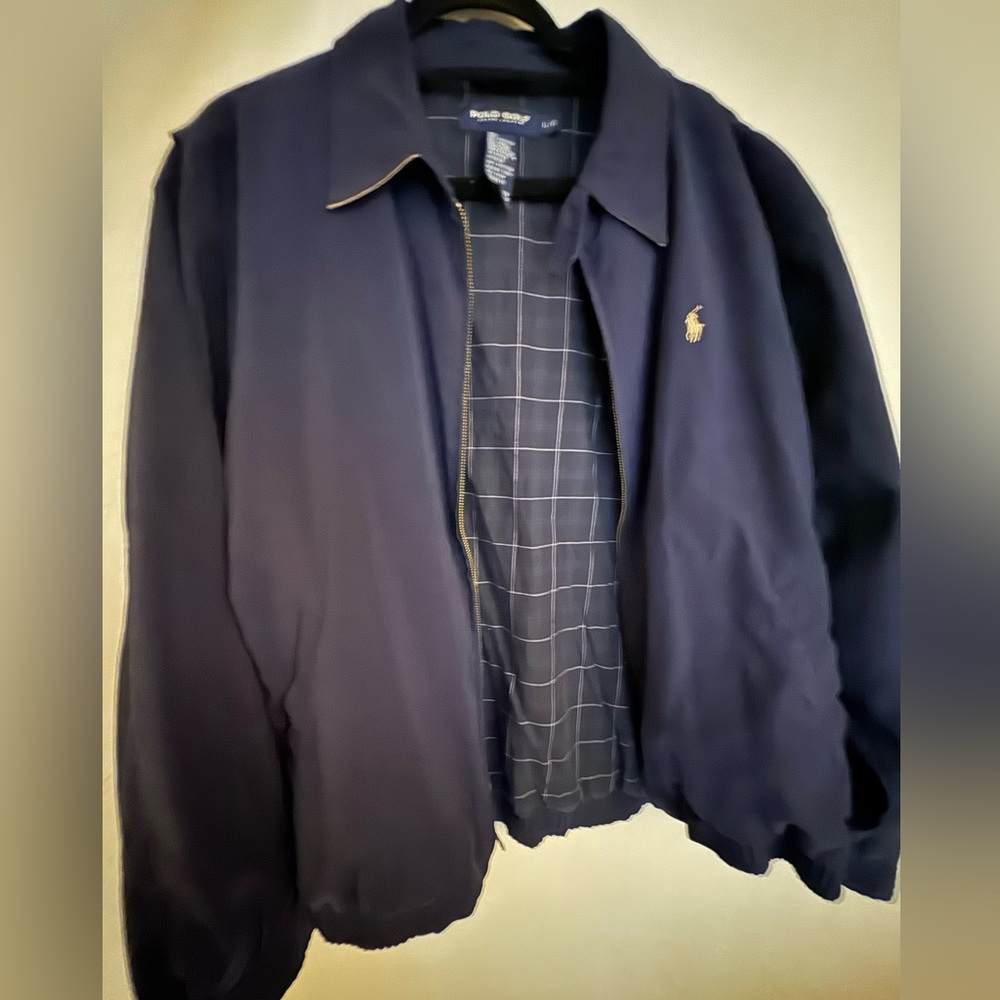 Blue polo jacket.